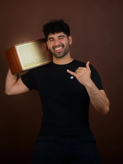 A fun, high-energy shot with a vintage-style speaker. This kind of creative portrait helps an actor or model stand out from the crowd.