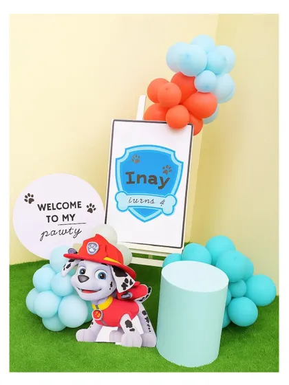 A 'Welcome to my Pawty' sign for Inay's 4th birthday. This cute entrance detail features a Marshall cutout and balloons in the classic Paw Patrol colors.