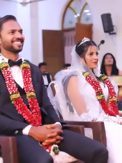 A beautiful shot of a Christian wedding ceremony in a church. The bride's makeup is classic and elegant, with a focus on natural beauty.
