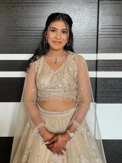 Just the right amount of glam. This look in a cream lehenga is perfect for someone who wants to look special without heavy makeup.