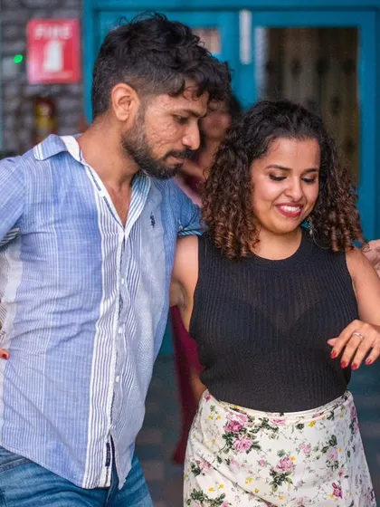 A close and focused dance. The connection between partners is key.