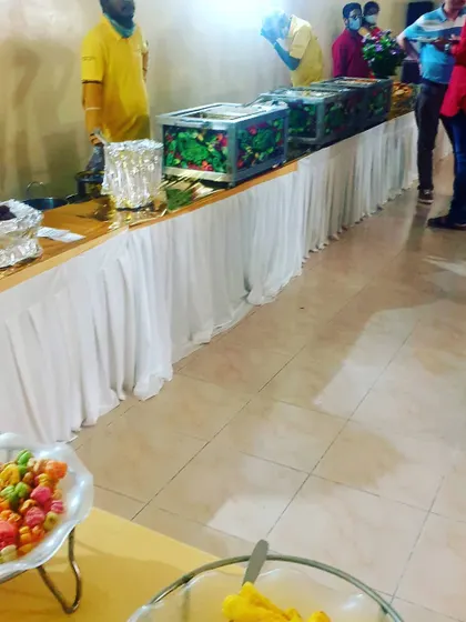 Another view of a straightforward buffet setup, showing how I can arrange food for easy access in any space.
