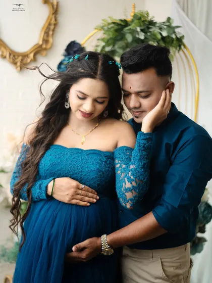 An intimate close-up of the couple. This tender moment beautifully captures their connection and anticipation as they await their baby.
