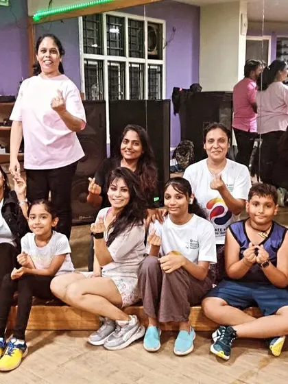 A series of group photos from our Women's Day celebration. So much love and positive energy in one room.