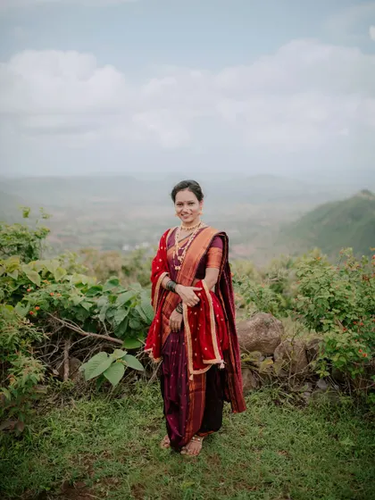 A beautiful bridal portrait in a traditional Nauvari saree, taken during a pre-wedding shoot in the hills.