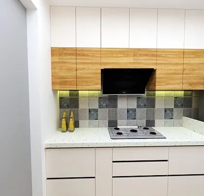 Another angle of the proposed kitchen design, showing the placement of the chimney and refrigerator. Our 3D visualizations help clients see exactly how their finished kitchen will look and function before we even start building.