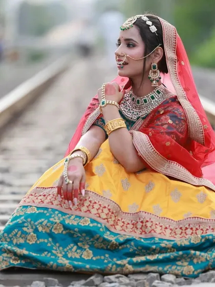 Another perspective from our railway track shoot. This side profile shot emphasizes the model's pose and the traditional nose ring, adding to the cinematic feel of the series.