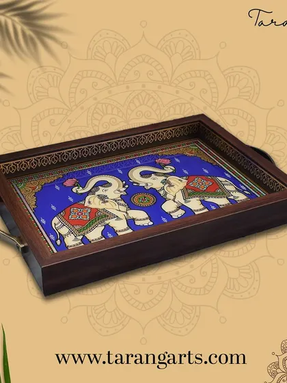 Serve your guests in style with this elegant tray featuring a glass painting of two royal elephants. This piece is both functional and decorative, making it a perfect blend of art and utility for your home.