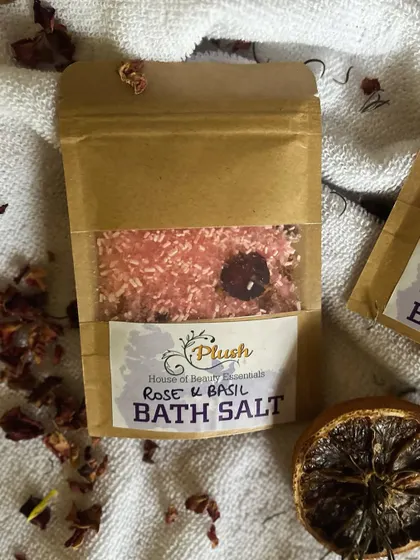A close-up of my Rose & Basil bath salt, made with real rose petals for a luxurious bath experience.