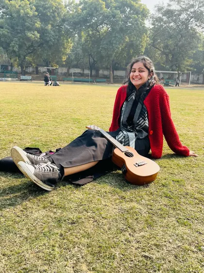 Chilling in the park with my ukulele on a sunny winter day. These are the moments of peace and joy that fuel my music.