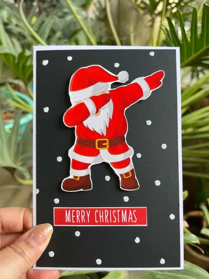 Another look at our fun dabbing Santa card, perfect for adding a touch of humor to your holiday greetings.
