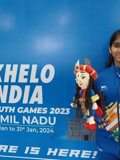 A proud moment for Anushka, holding her Gold medal and mascot from the Khelo India Youth Games.