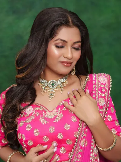 A signature "no-makeup" makeup look, focusing on glowing skin and natural enhancement.