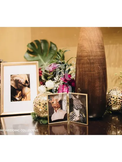 For the 'Savannah Splendour' Sangeet, we placed quirky, dressed-up animal portraits on the tables. This detail reinforced the theme in a fun and unexpected way, giving guests a delightful surprise at their seats.