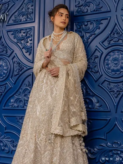 A full view of the radiant golden lehenga, a perfect harmony of tradition and modern sophistication for the bride who commands attention.