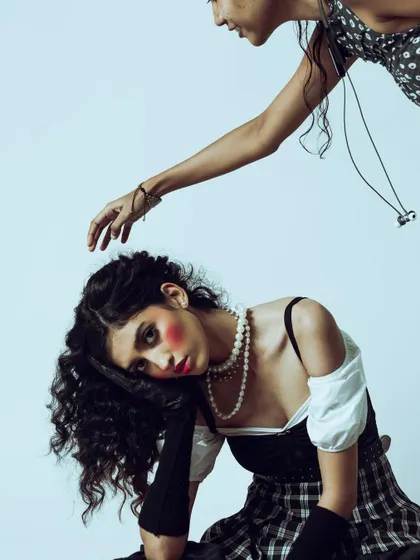 An artistic composition playing with layers and interaction. This kind of creative shot adds depth to an editorial story.