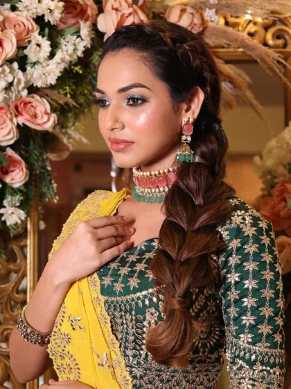 A captivating green eye look for a Mehendi ceremony. Your portfolio will include looks for all wedding events, showing your range.