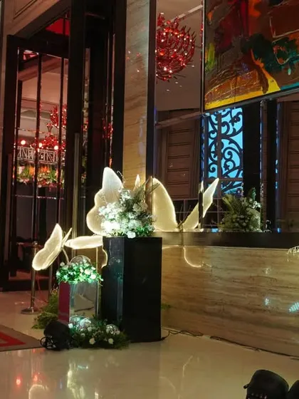 These illuminated butterfly installations added a touch of whimsy and magic to the reception decor, creating a beautiful and unique photo opportunity.