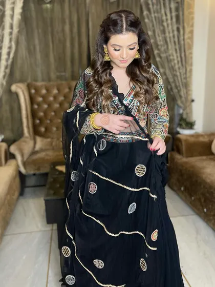 The full look, showing how the soft makeup allows the beautiful outfit and the client's natural beauty to be the focus.