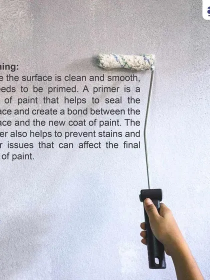 After cleaning and smoothing, we apply a coat of high-quality primer. This seals the surface, prevents stains from bleeding through, and creates a perfect bond between the wall and the new paint for maximum durability.