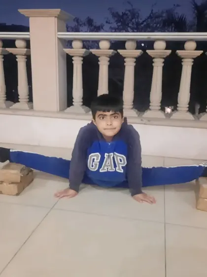 Progressive stretching is key to avoiding injury. Here, we use blocks to help a student safely increase the depth of his split, building flexibility over time.