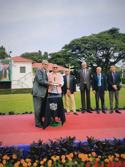 Mr. V. Hari Mohan Naidu presents the memorial trophy to the winning connections.