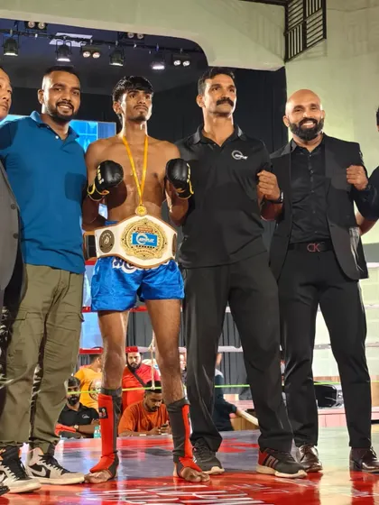 Another shot with the champion and his team. It takes a village to build a champion, and we are a strong one.
