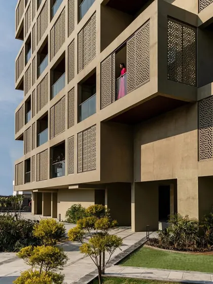 I feature groundbreaking projects like 'SCREEN 504' by Sanjay Puri Architects, a nominee at the World Architecture Festival. This building's perforated screen facade is a brilliant, climate-sensitive response to the heat of Udaipur, showcasing regional context with modern function.