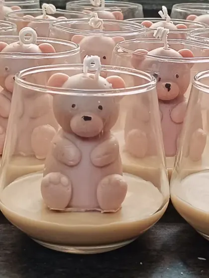 A side view of the teddy bear jar candles.