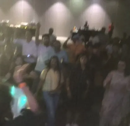 A blurry shot that perfectly captures the wild energy of the dance floor. This corporate event was a night of non-stop dancing.