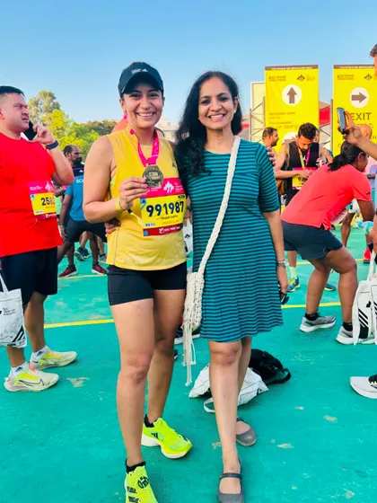 A duplicate of image 54. With my nutritionist after the TCS10K. Proper fueling is a critical component of performance.