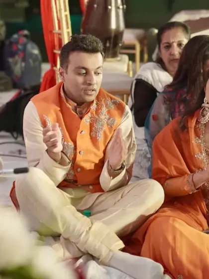 The couple participates in a traditional Sai Bhajan and Behrano ceremony, a spiritual and soulful start to their wedding festivities.