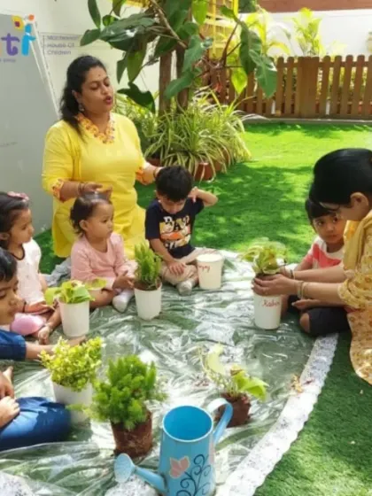 Teachers and children gather for a gardening session. On World Environment Day, we reaffirm our commitment to nurturing hearts that protect our planet.