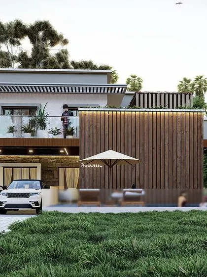 A farmhouse-style modern home set in a lush green landscape. The design features a large patio area, a slatted wood privacy screen, and a prominent balcony to connect the living space with nature.