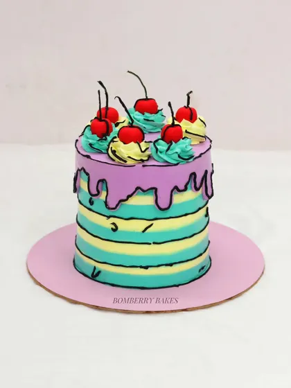 Another take on the popular comic book cake trend, this one with a purple drip and vibrant colors. It’s a playful design that always gets a great reaction.