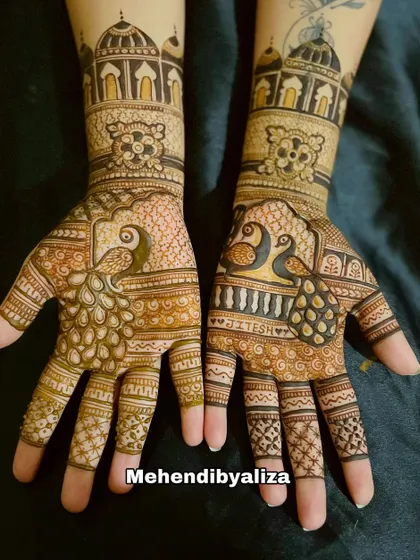 A gorgeous design for the Teej festival, featuring majestic peacocks and architectural dome motifs. This is a popular theme for celebrating the monsoon festival.