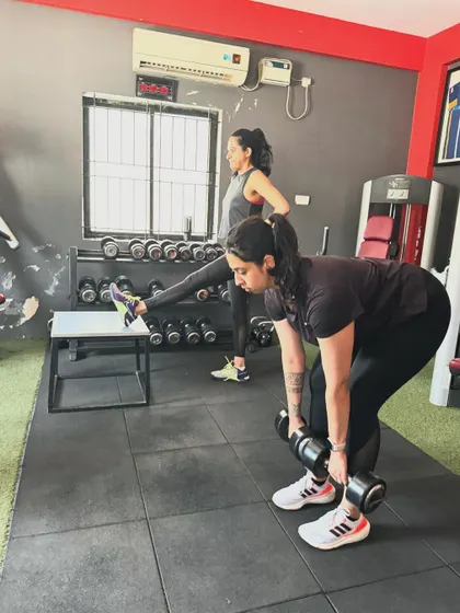 A duplicate of 124, showing clients training together.