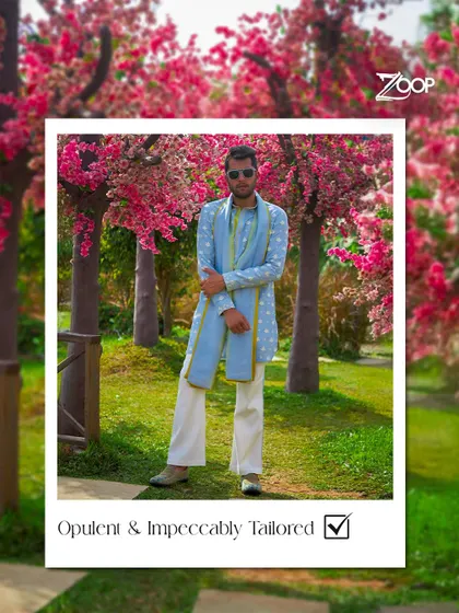 From our Jazbaat Collection, this opulent and impeccably tailored kurta set is for the modern man who demands perfection. The vibrant blue and unique scarf make it a standout piece.