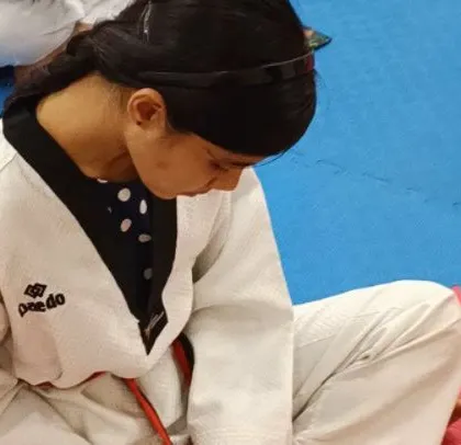 A moment of rest and focus for a student during a tough class.
