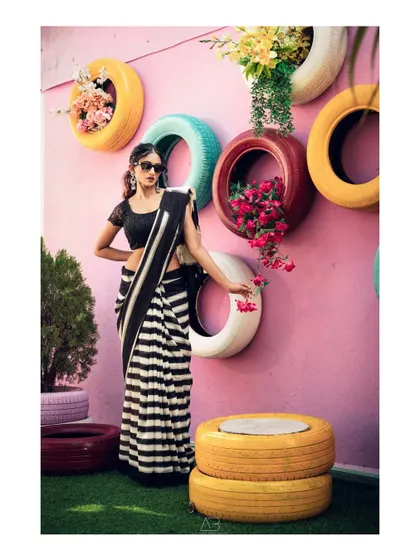 A duplicate of image 89, this modern saree portrait is fun and fashionable, using a unique background to create a memorable shot.