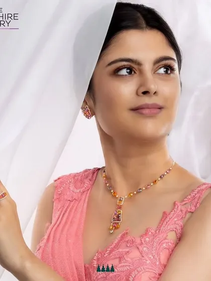 A beautiful shot from 'The Sapphire Story' campaign for Vummidi Bangaru Jewellers. We styled this multi-colored sapphire and diamond necklace with a delicate pink lace dress, creating a soft and romantic look.