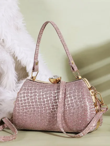 This shot features a rose gold glitter clutch against a fluffy white background. The composition is soft, dreamy, and luxurious, highlighting the bag's texture and color.