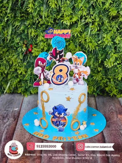 Gotta go fast! A Sonic the Hedgehog cake for an 8th birthday, complete with golden rings and characters like Tails and Knuckles. A speedy and fun choice for a gamer's party.