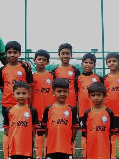 The full U-9 squad with their coaches, looking sharp in their BPSS kits. I believe in fostering a professional attitude from a young age.