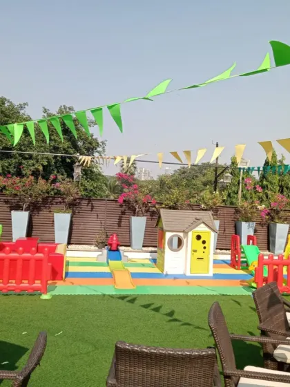 A wide view of a terrace playzone, complete with party banners. This shows how my setup can be the centerpiece of your celebration, creating a festive and fun atmosphere for your little guests.