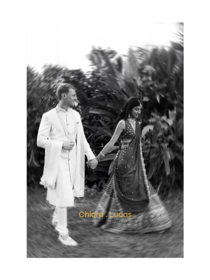An artistic, motion-blur shot of the couple walking, giving the photo a dreamy, romantic quality.