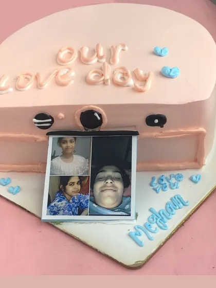 Say cheese! This unique camera-shaped cake features a pull-out strip of edible photos, making it a wonderfully personal and interactive gift for a loved one.