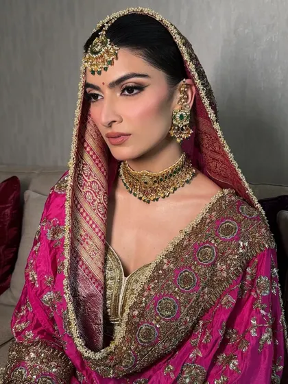 Another angle of this traditional and regal look. The way she has draped her dupatta adds a touch of old-world charm, which we complemented with timeless makeup.