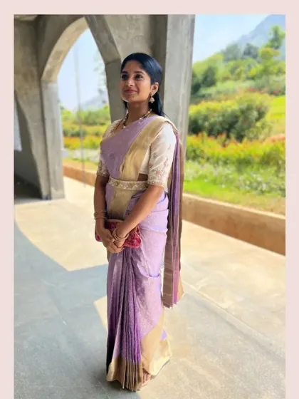 A client looking captivating in a vibrant customized silk blouse.