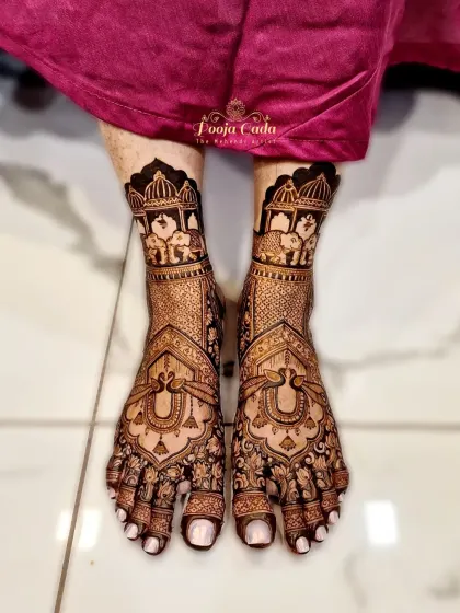 A royal design for the feet, with elephants in a howdah (seat) set against an architectural backdrop.